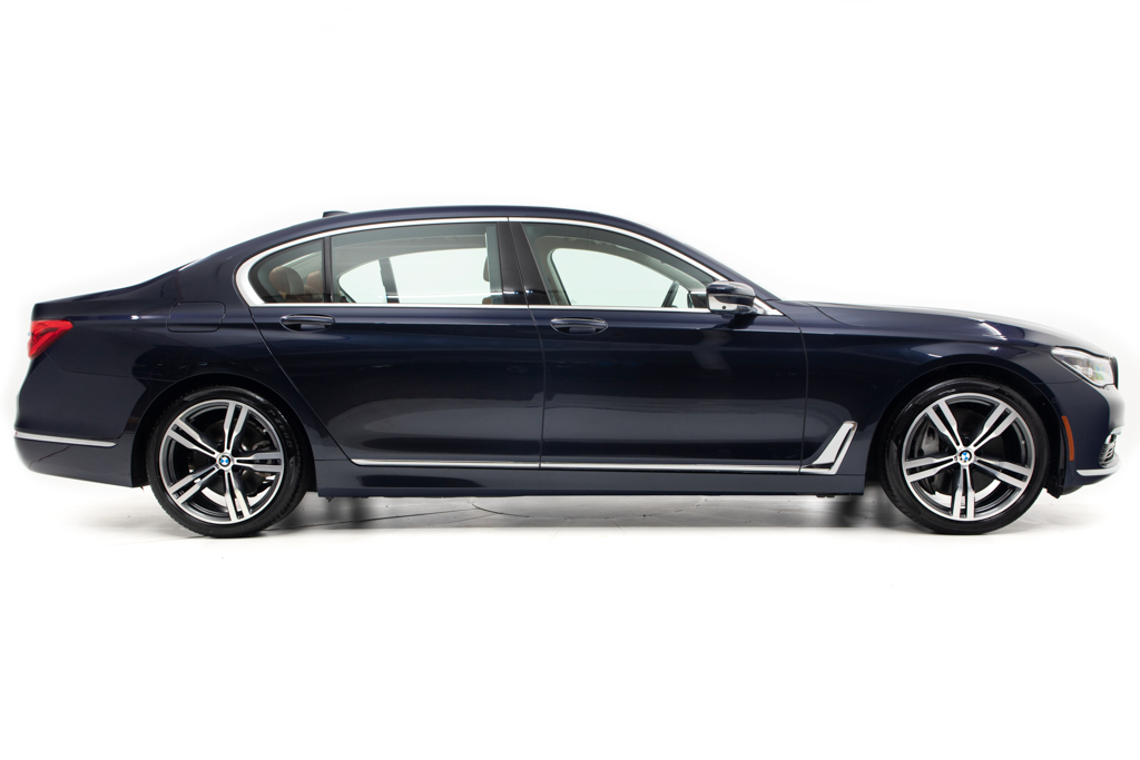 An incredible side shot photo of a car that you should buy.