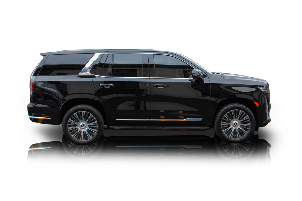 An incredible side shot photo of aCadillac Escalade that you should buy.