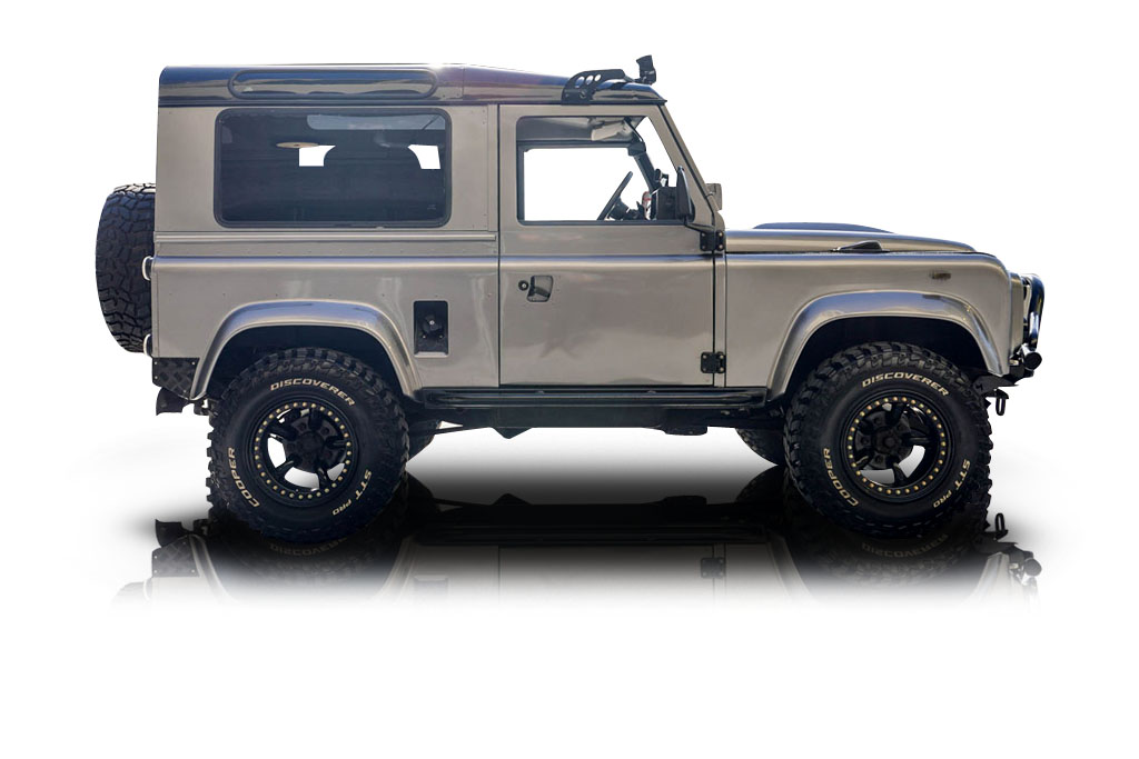 An incredible side shot photo of aLand Rover Defender 90 that you should buy.