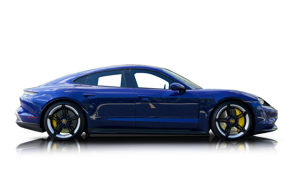 An incredible side shot photo of aPorsche Taycan that you should buy.