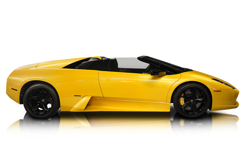 An incredible side shot photo of a car that you should buy.