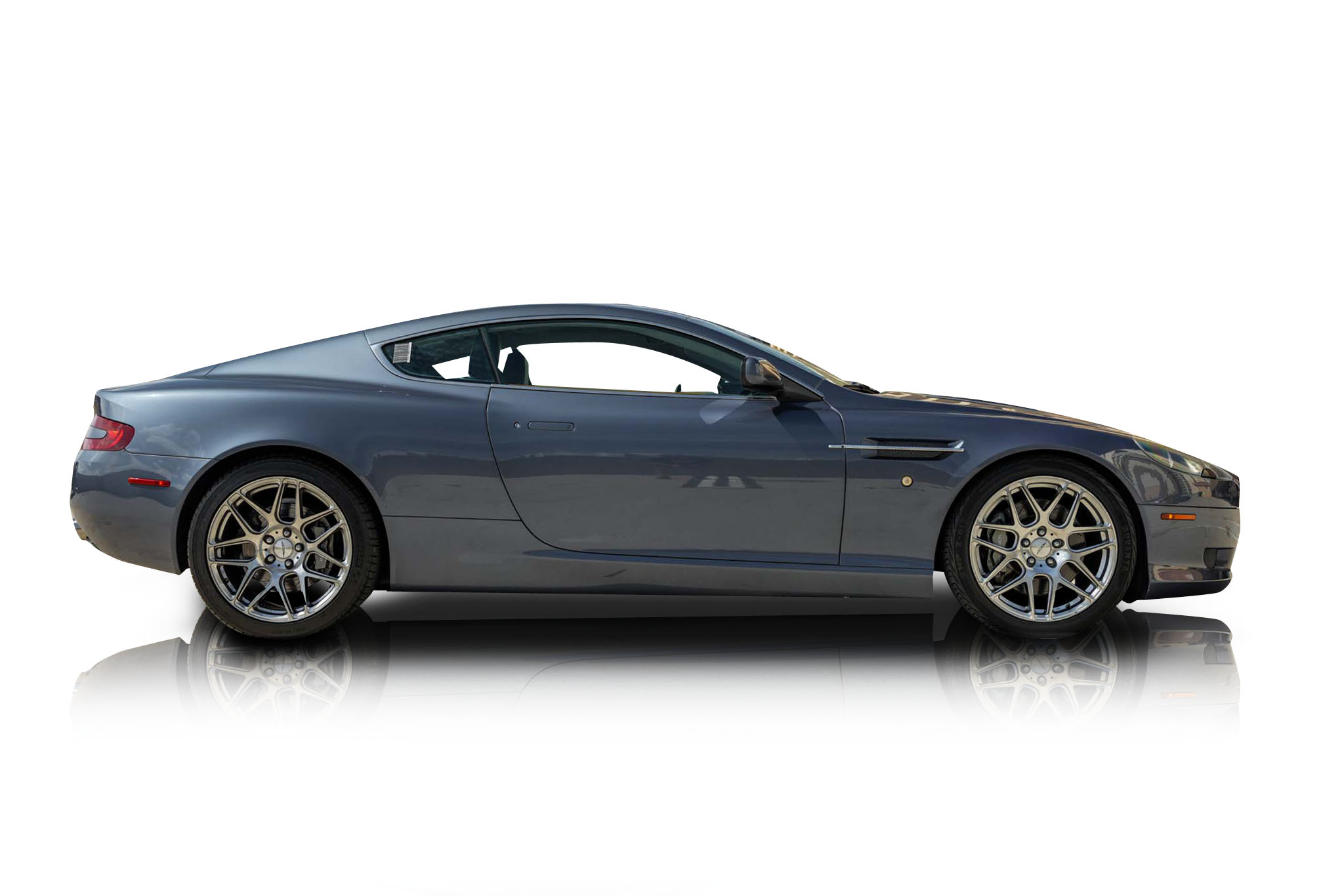 An incredible side shot photo of aAston Martin DB9 that you should buy.