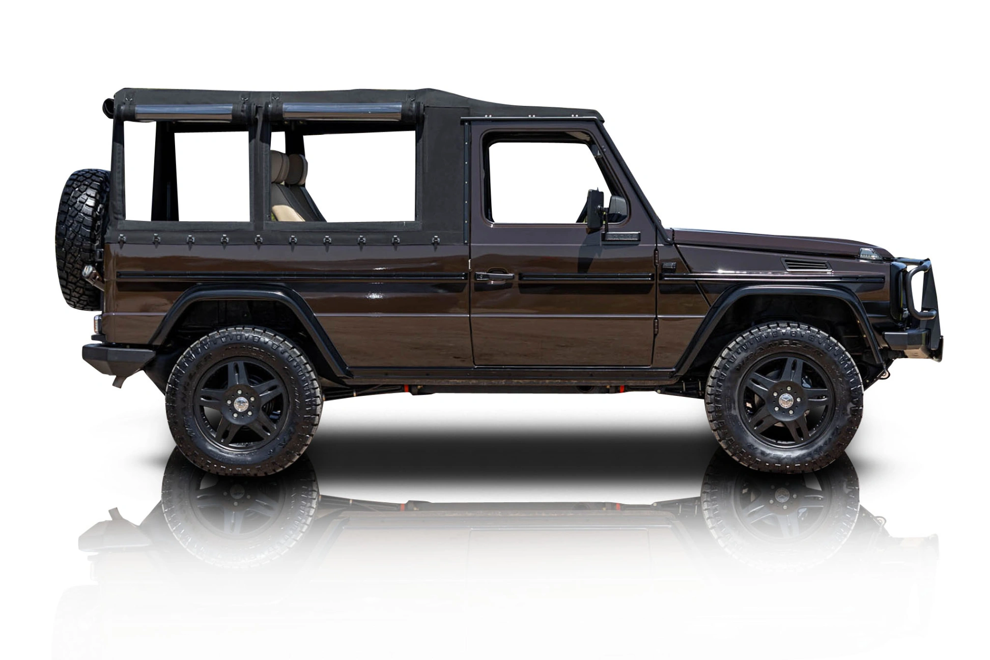 An incredible side shot photo of a Mercedes-Benz 230GE that you should buy.