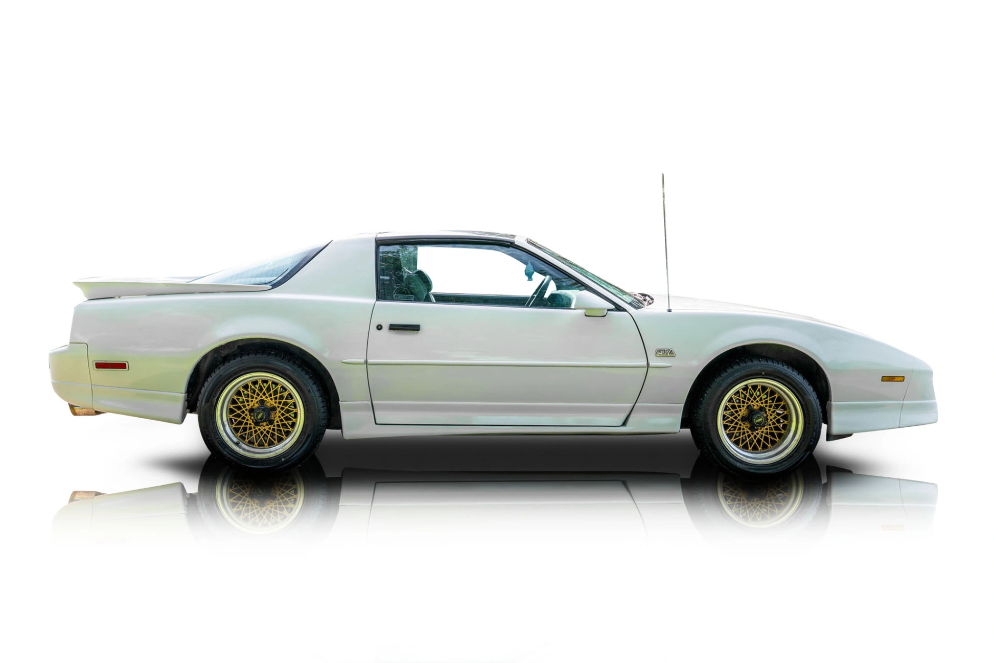 An incredible side shot photo of a Pontiac Firebird that you should buy.