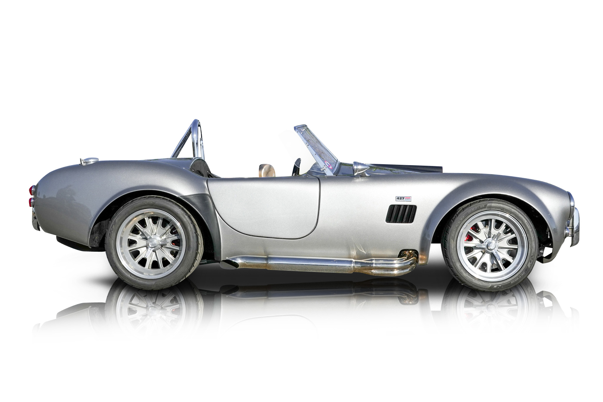 An incredible side shot photo of aShelby Cobra that you should buy.