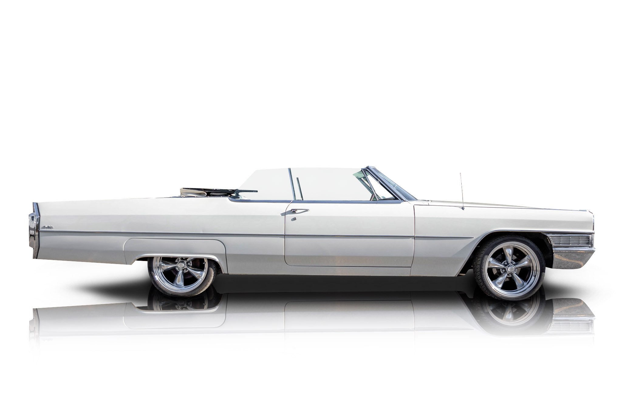 An incredible side shot photo of aCadillac DeVille that you should buy.