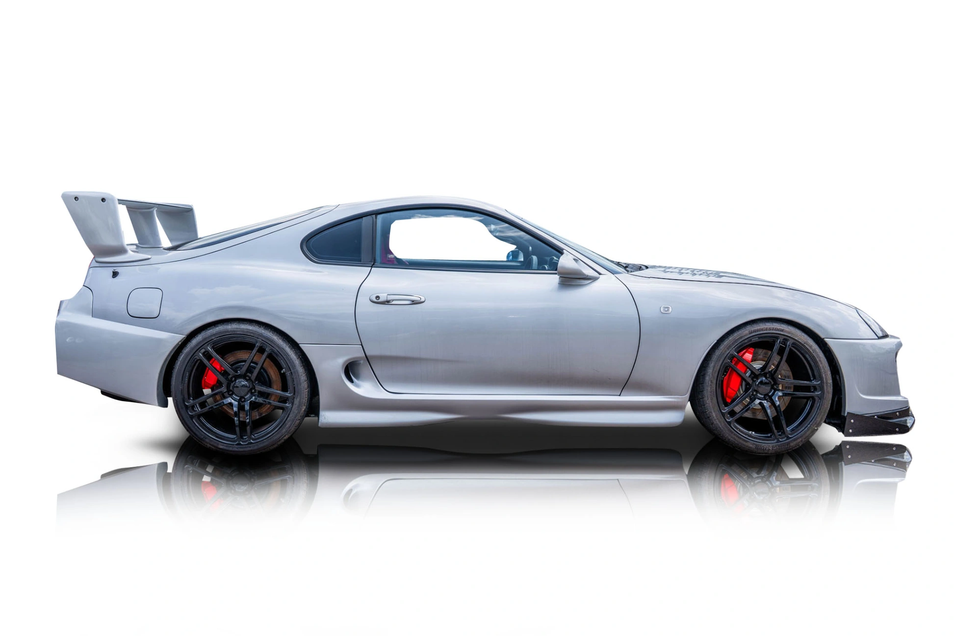 An incredible side shot photo of a car that you should buy.
