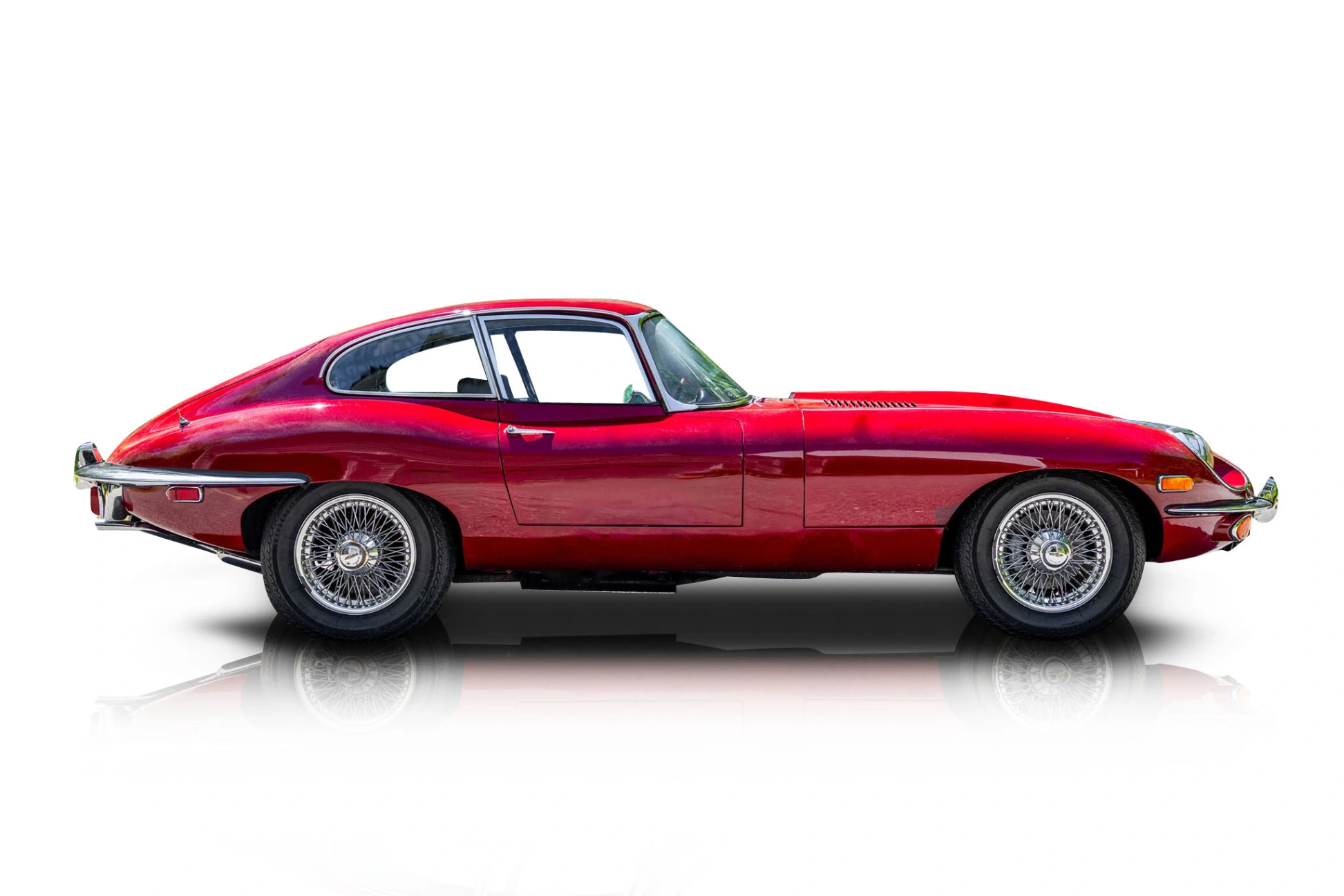 An incredible side shot photo of a Jaguar XKE that you should buy.