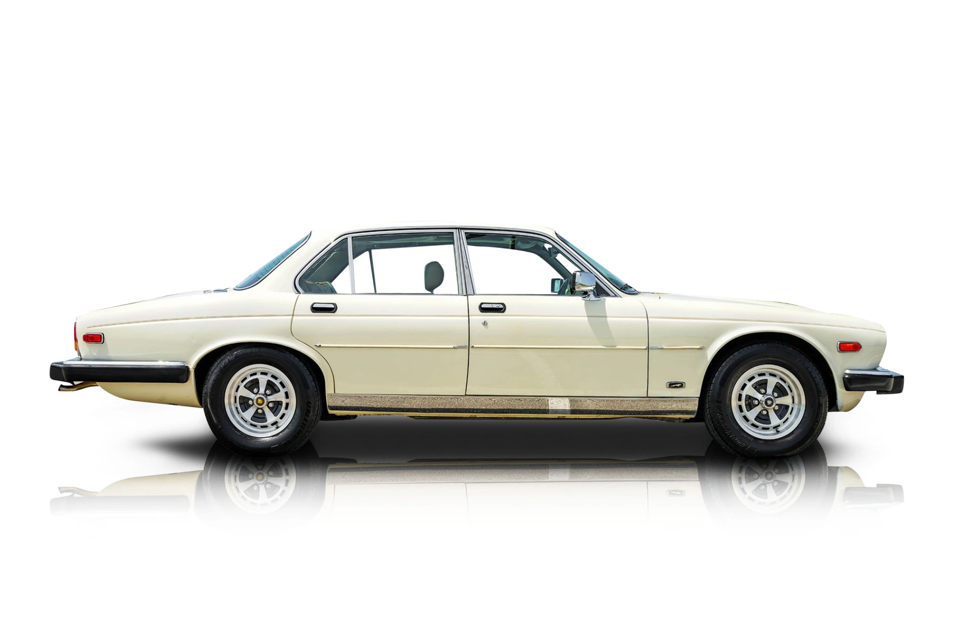 An incredible side shot photo of a Jaguar XJ6 that you should buy.