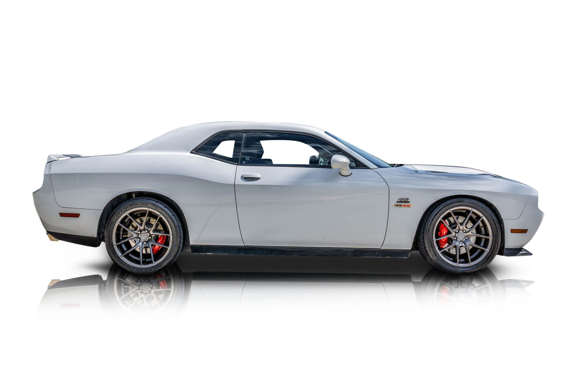 An incredible side shot photo of a Dodge Challenger that you should buy.