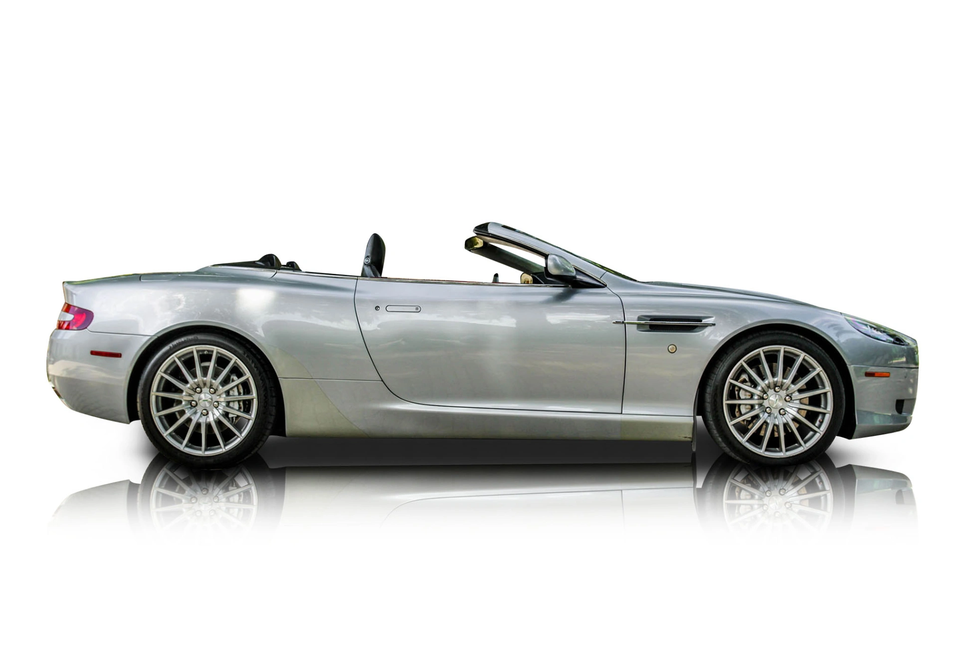 An incredible side shot photo of aAston Martin DB9 that you should buy.