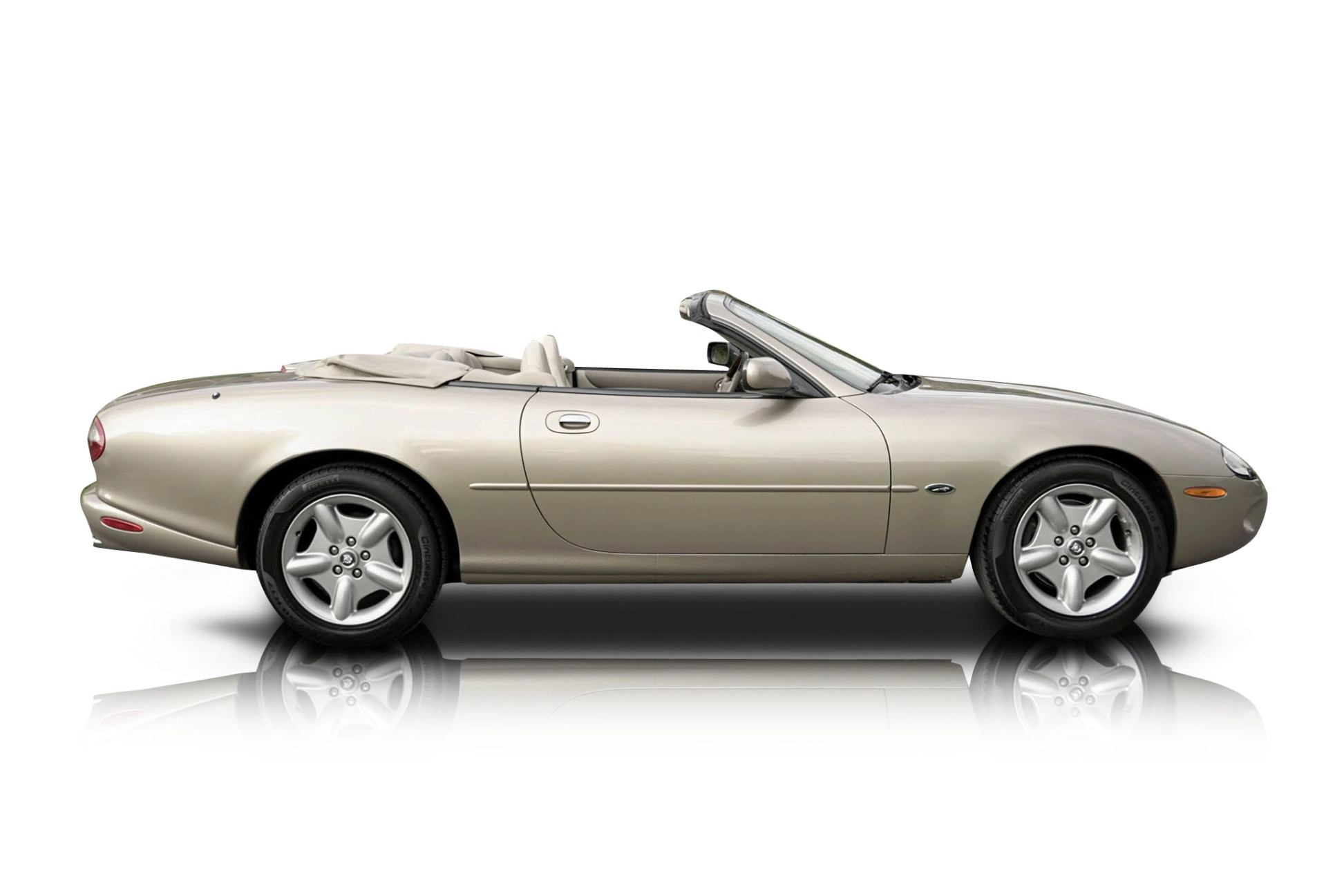 An incredible side shot photo of a Jaguar XK that you should buy.