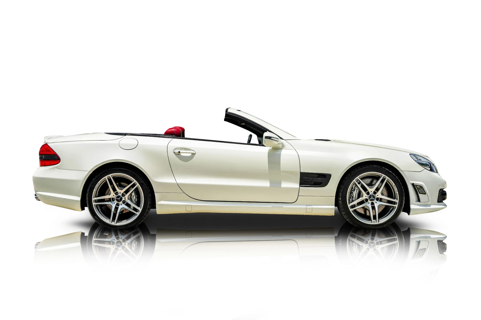 An incredible side shot photo of a car that you should buy.
