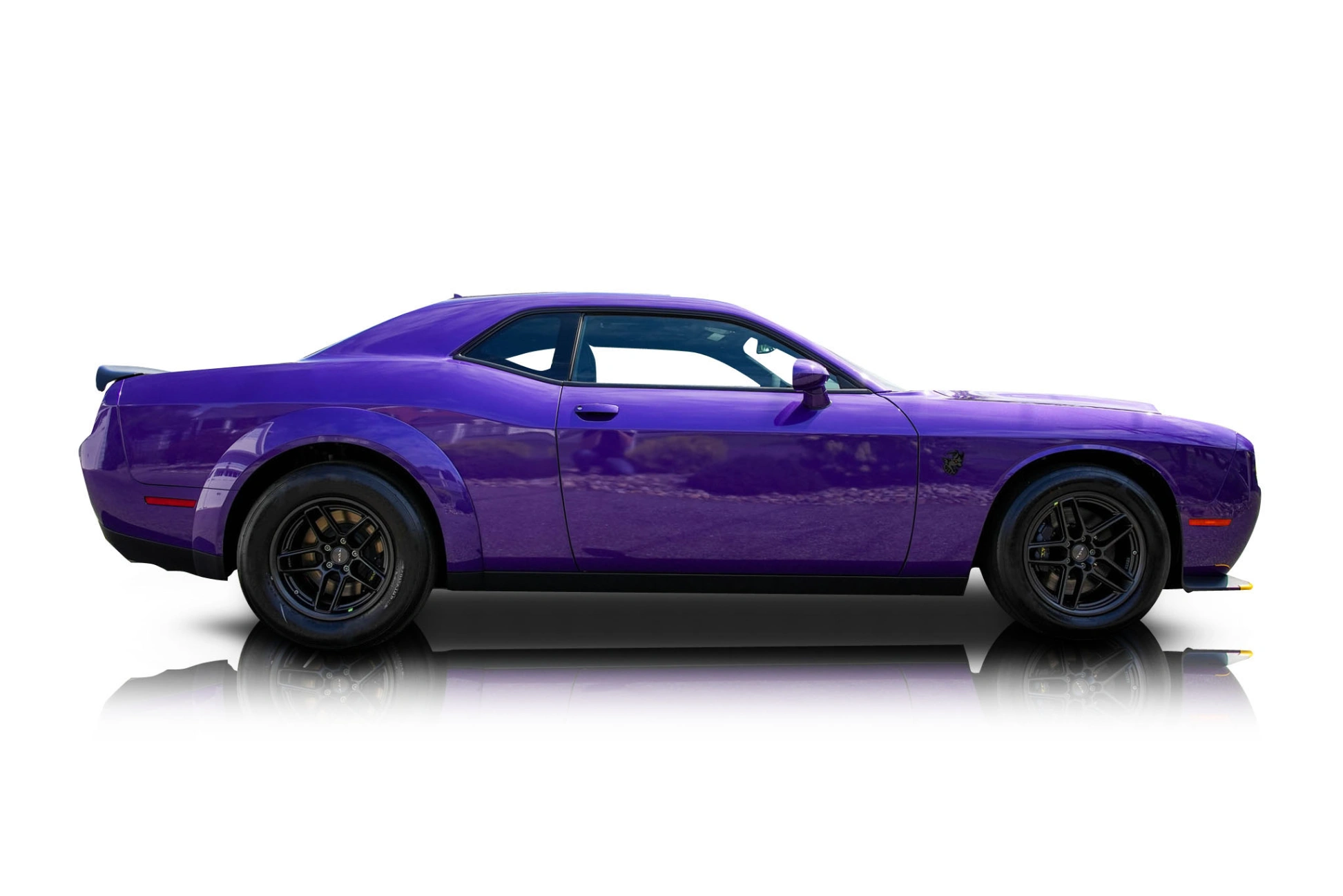 An incredible side shot photo of a Dodge Challenger that you should buy.