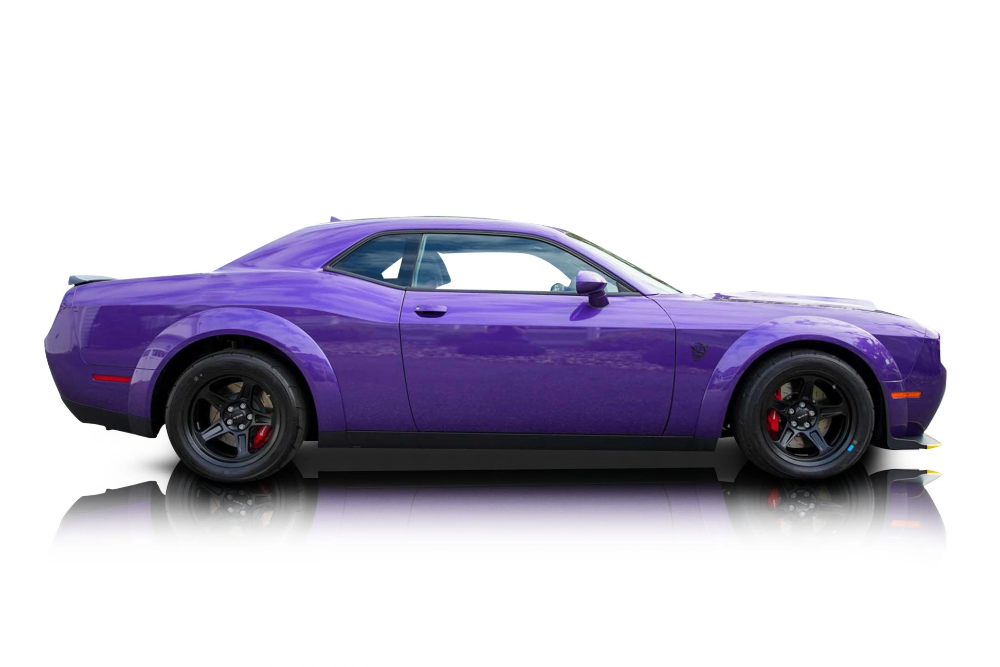 An incredible side shot photo of a Dodge Challenger that you should buy.