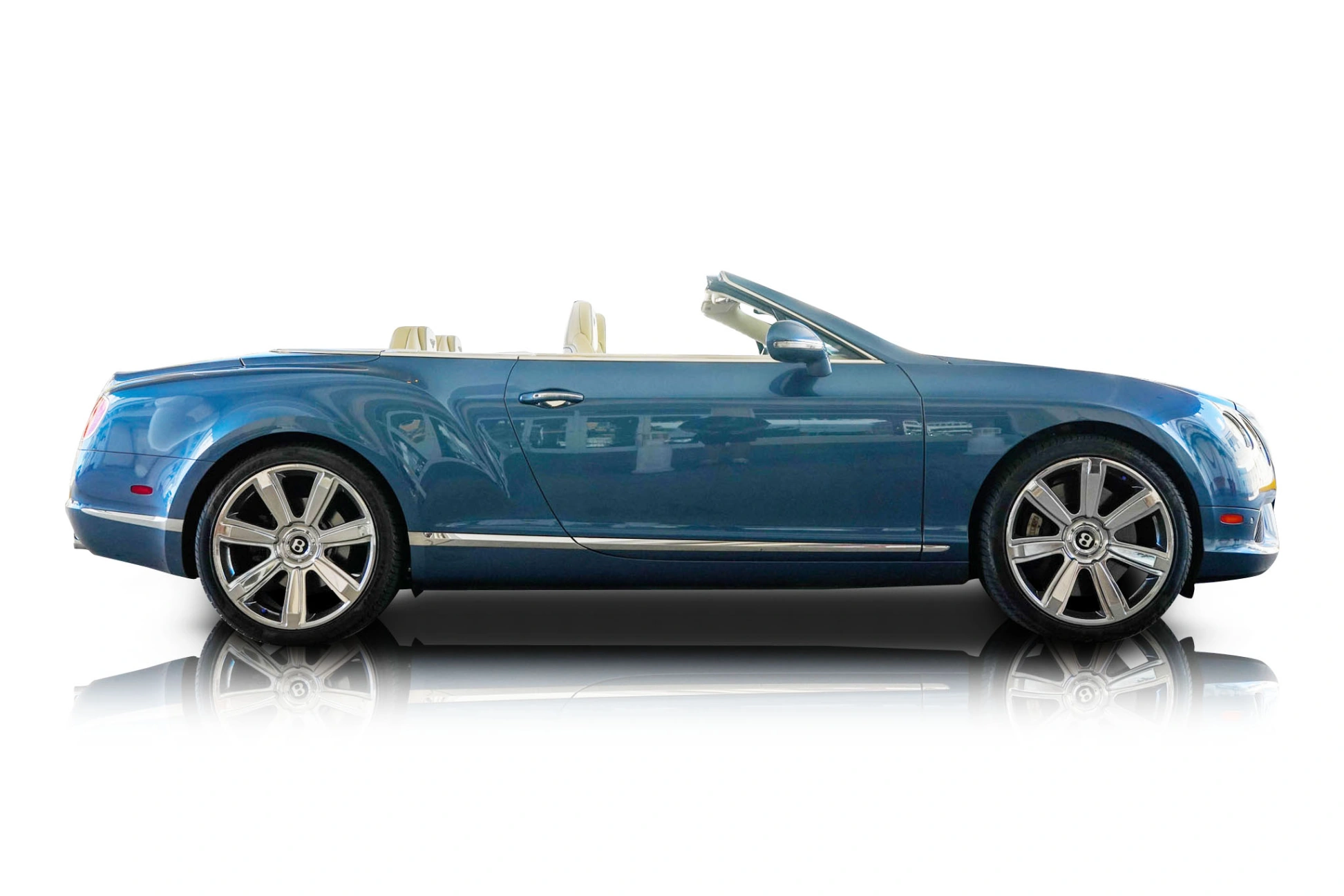 An incredible side shot photo of a Bentley Continental that you should buy.