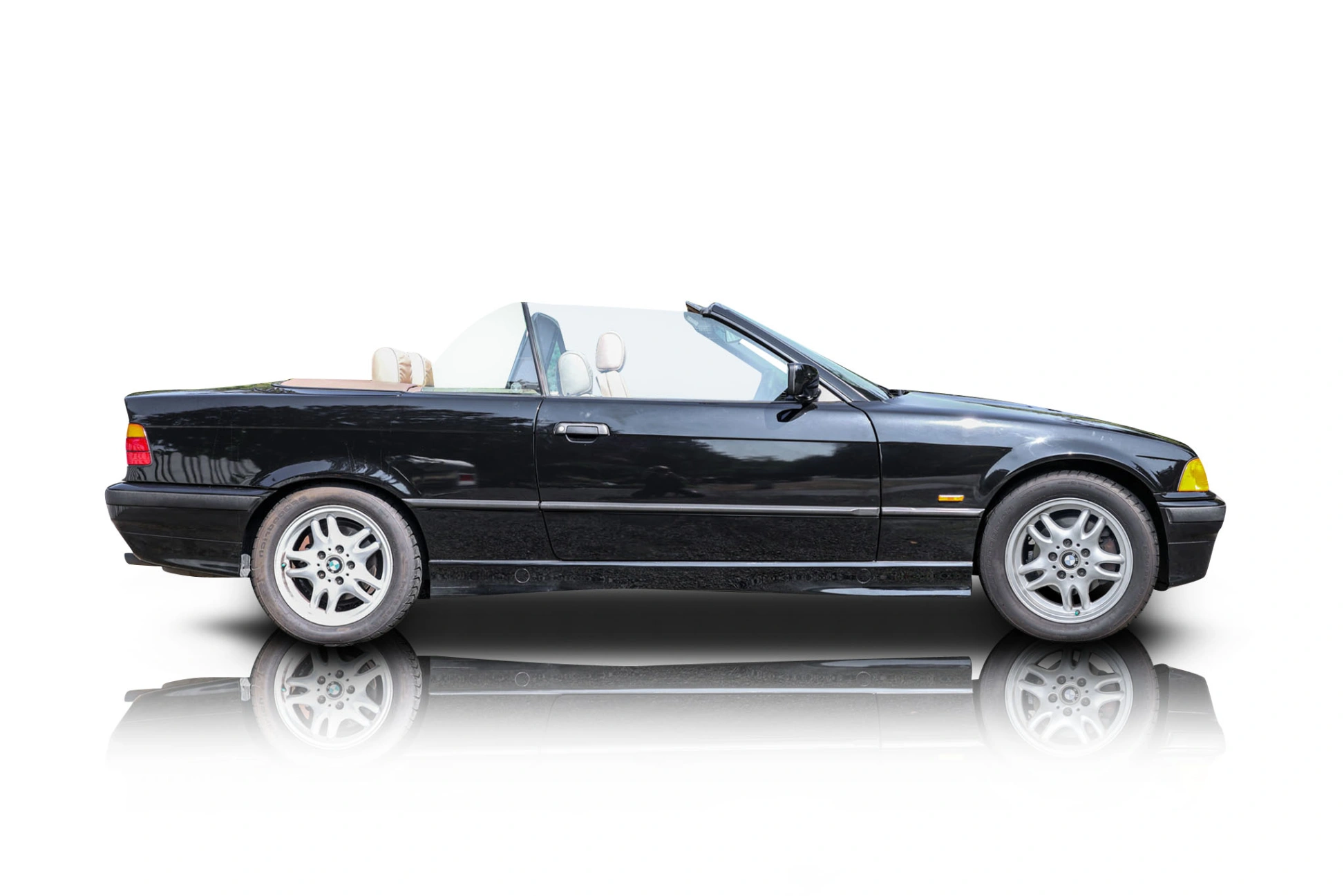 An incredible side shot photo of a BMW 323i that you should buy.