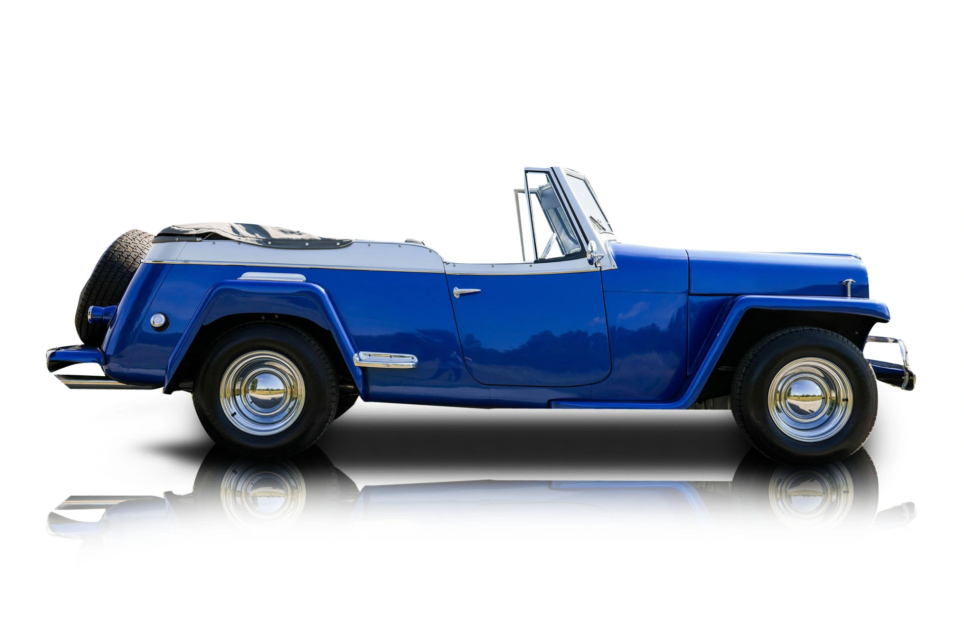 An incredible side shot photo of a Willys Jeepster that you should buy.