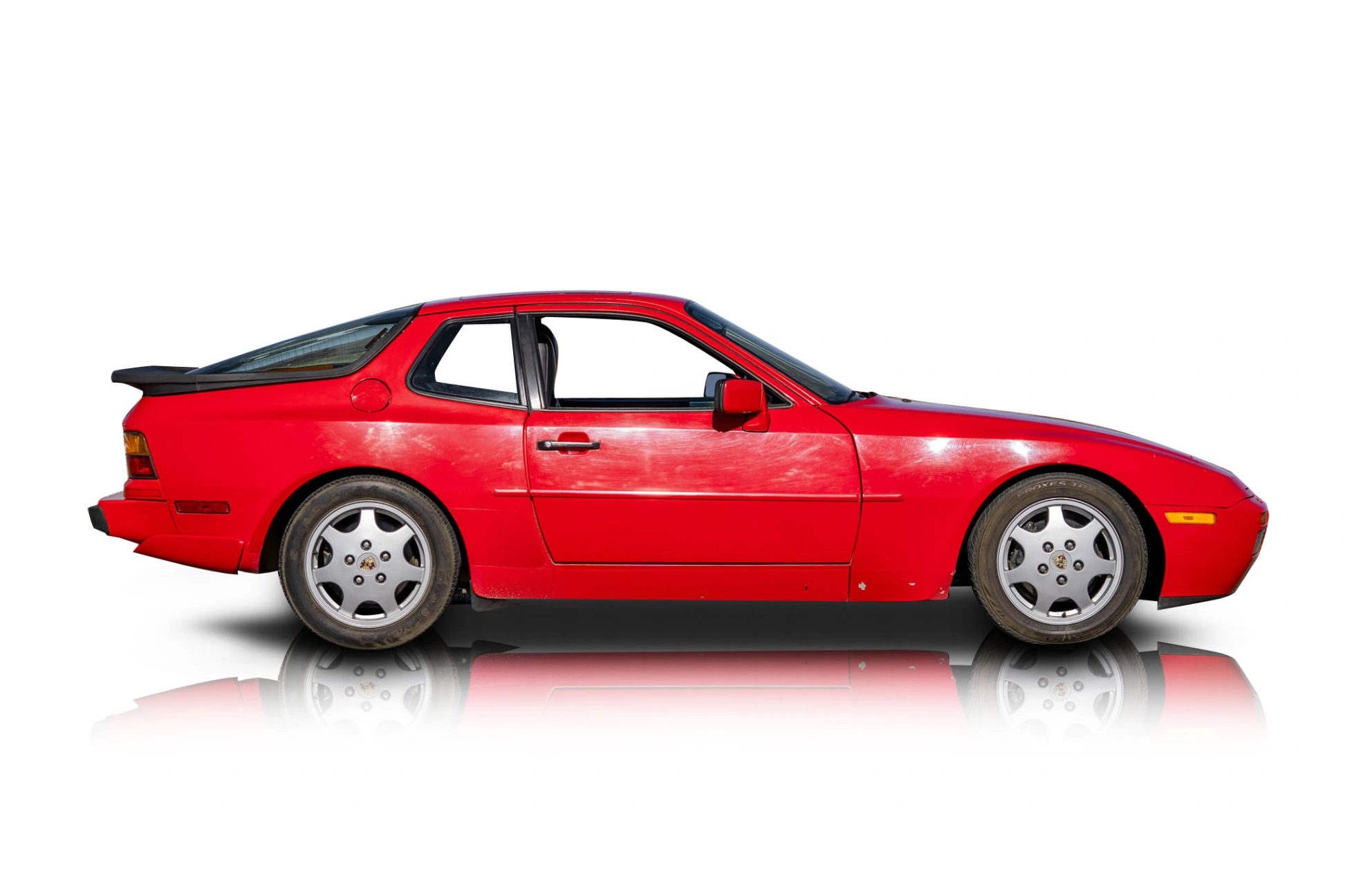 An incredible side shot photo of a Porsche 944 that you should buy.