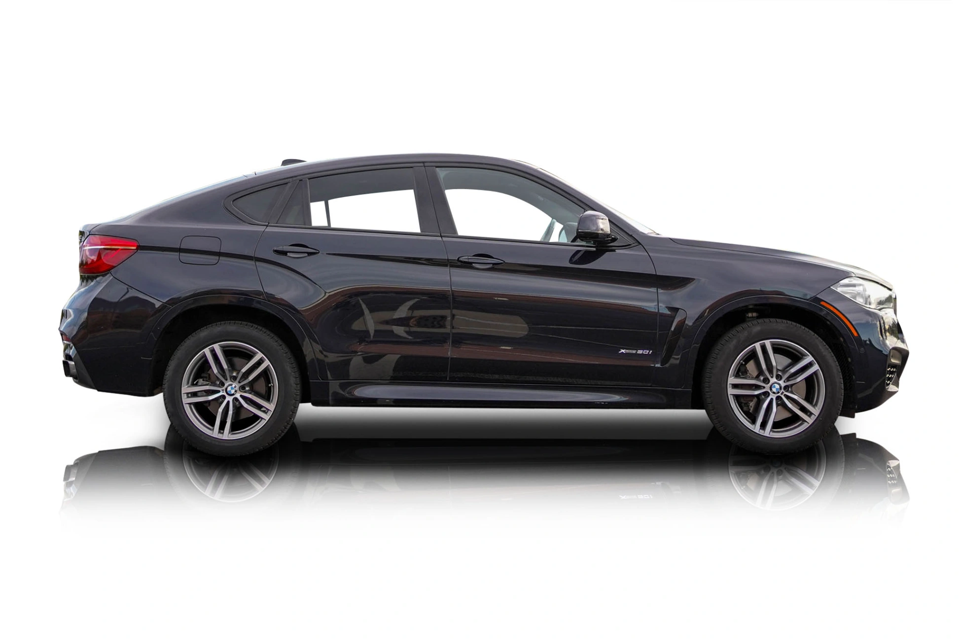 An incredible side shot photo of a car that you should buy.