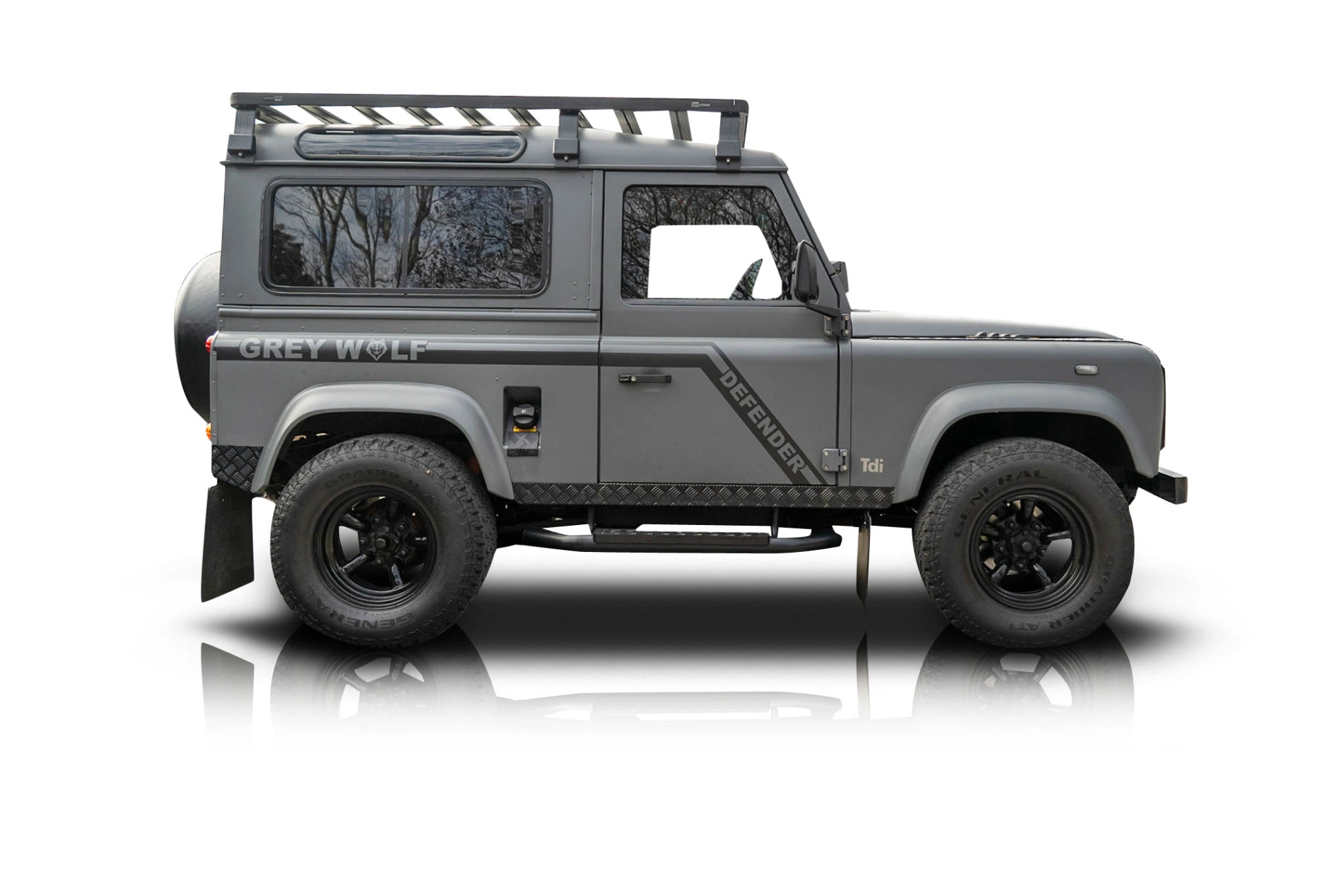 An incredible side shot photo of a Land Rover Defender 90 that you should buy.