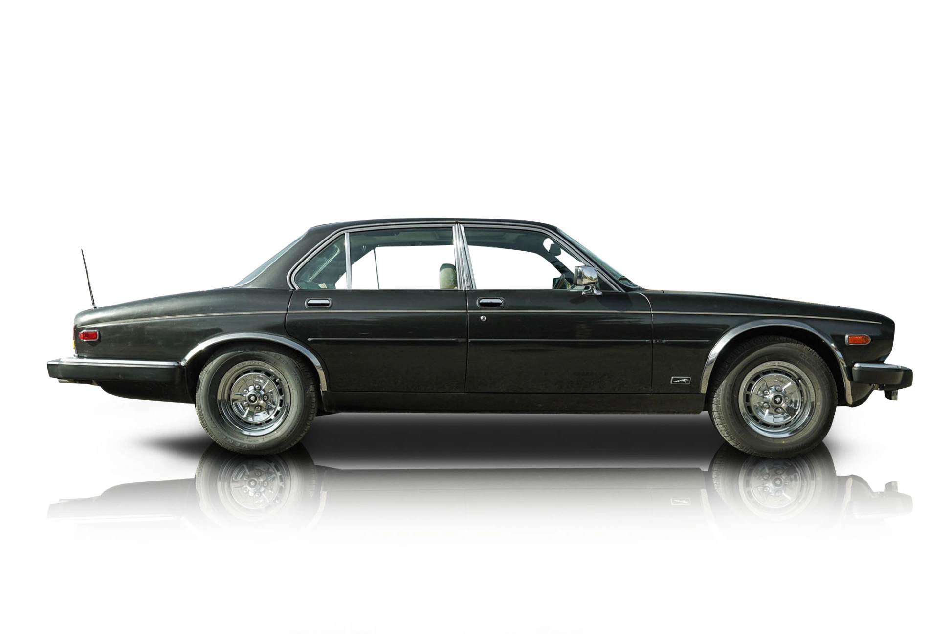 An incredible side shot photo of a Jaguar XJ6 that you should buy.