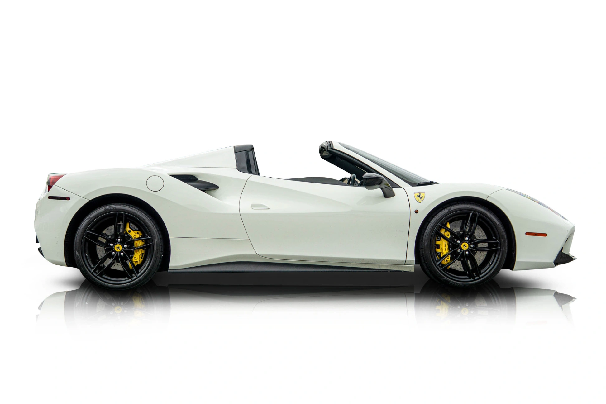 An incredible side shot photo of a Ferrari 488 Spider that you should buy.