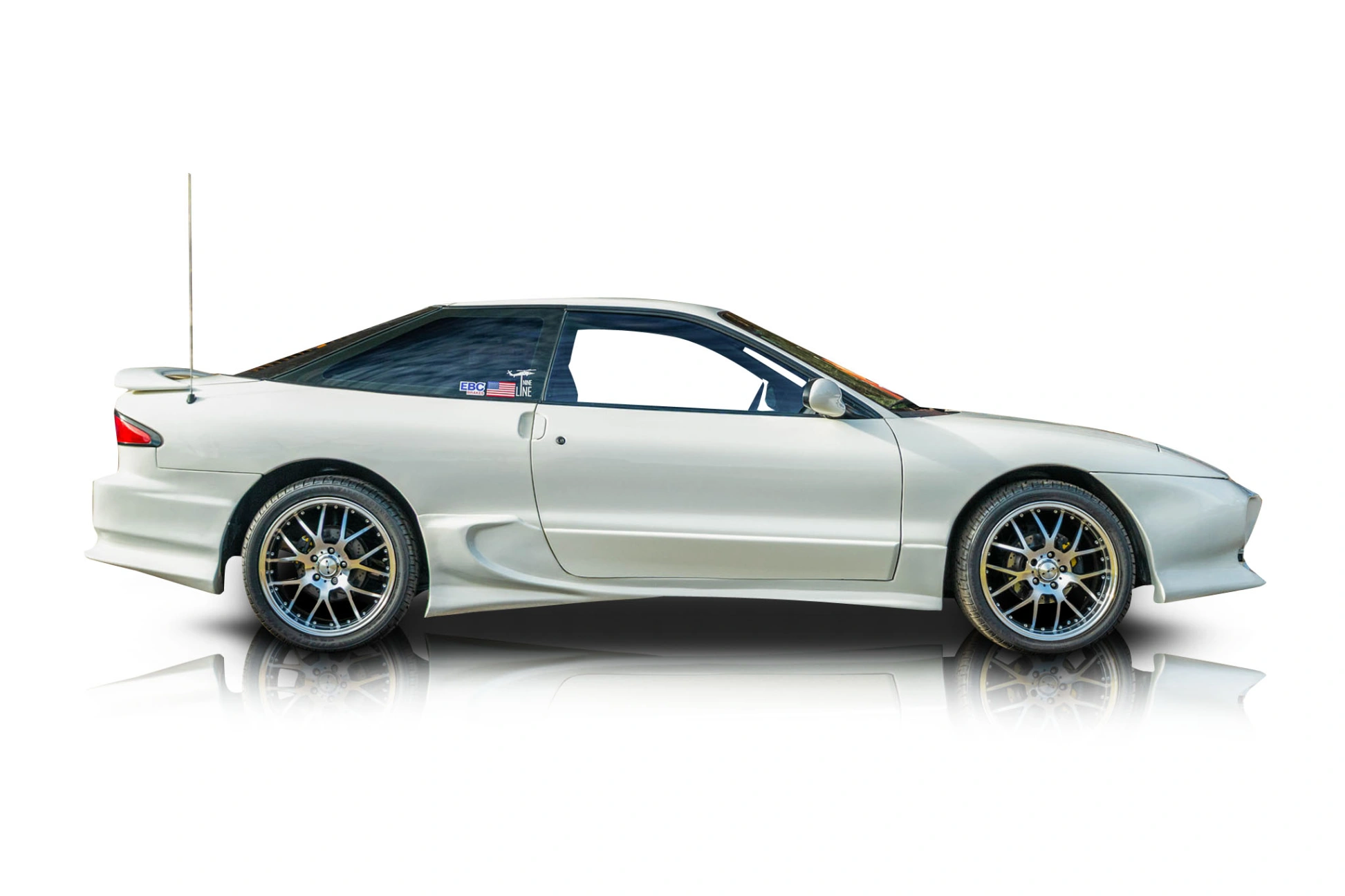 An incredible side shot photo of a Ford Probe that you should buy.