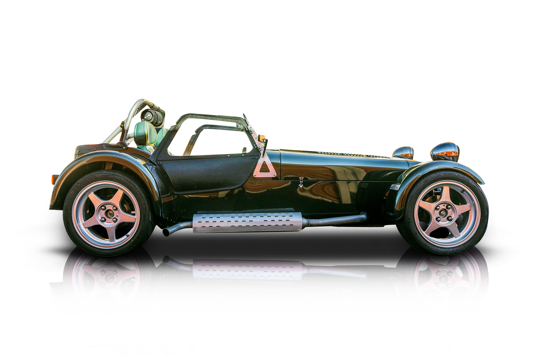 An incredible side shot photo of a Caterham Super Seven that you should buy.