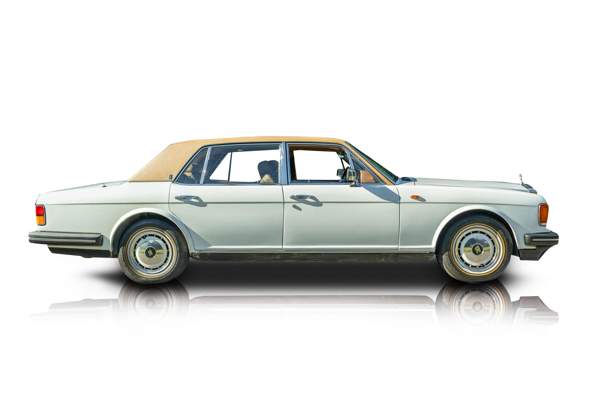 An incredible side shot photo of a Rolls-Royce Silver Spur that you should buy.