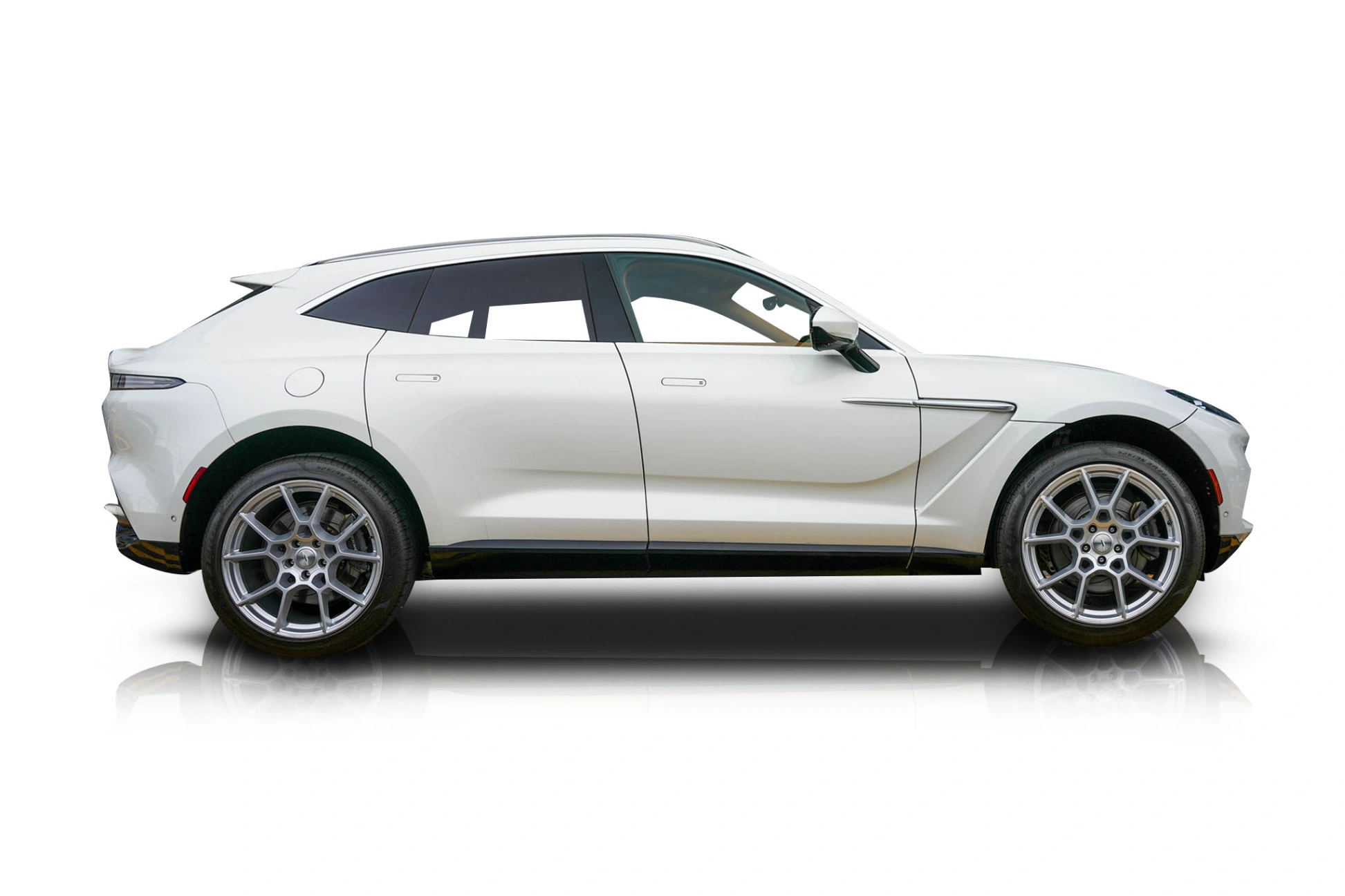 An incredible side shot photo of a Aston Martin DBX that you should buy.