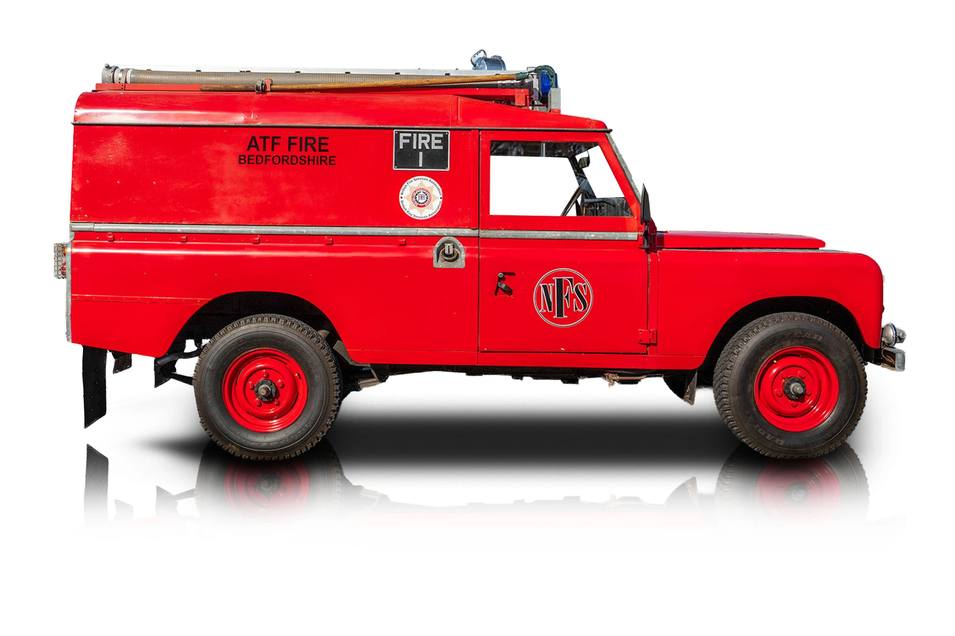 An incredible side shot photo of a Land Rover Series IIIA that you should buy.