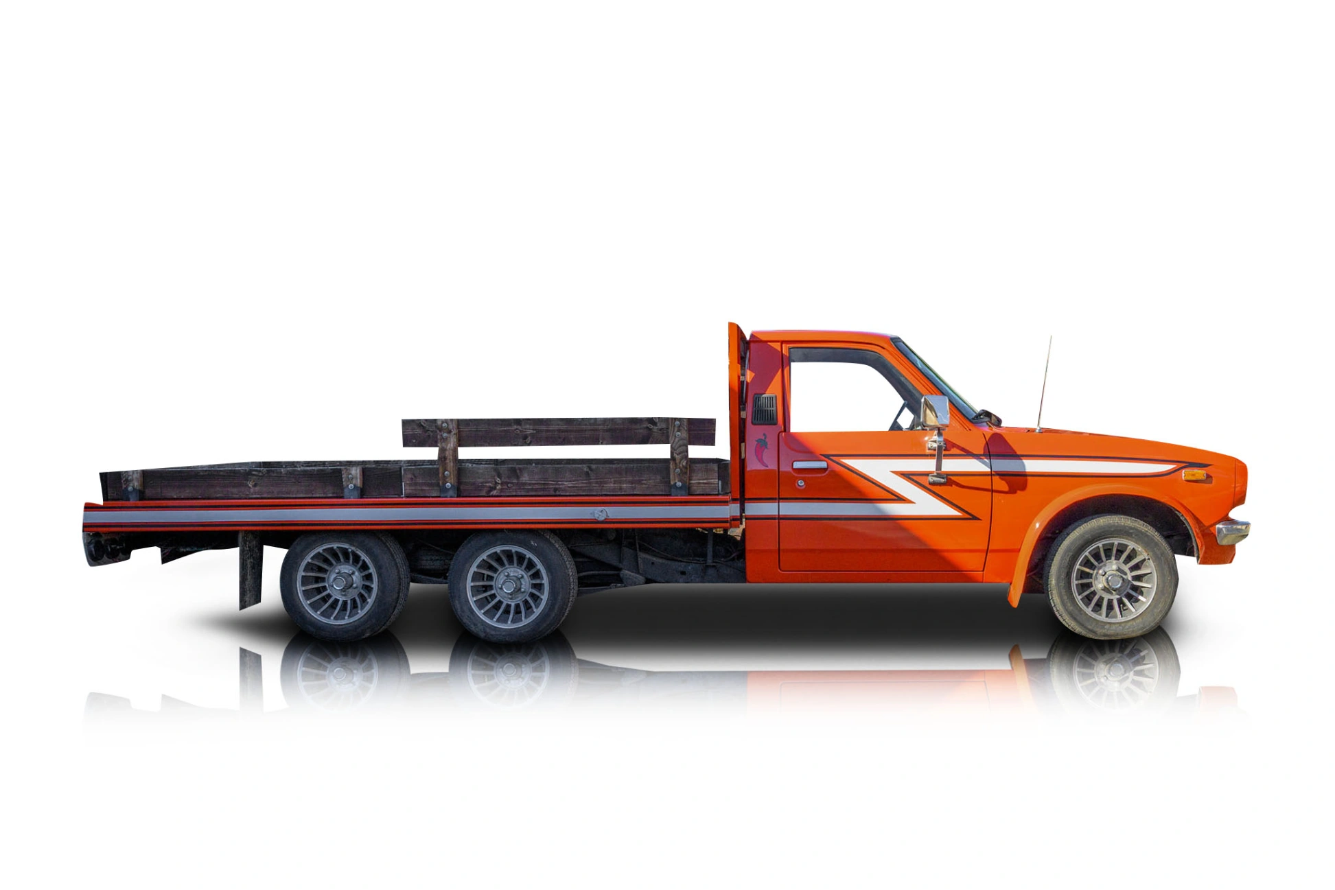 An incredible side shot photo of a Toyota Hilux that you should buy.