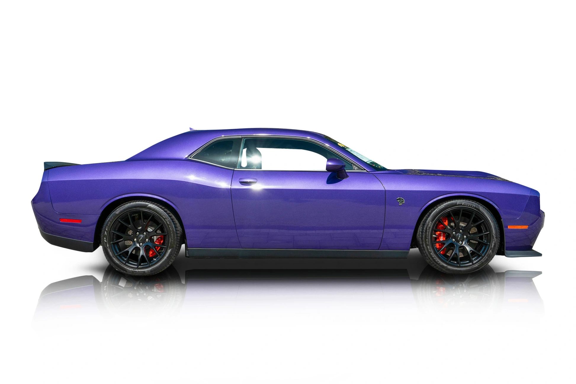 An incredible side shot photo of a Dodge Challenger that you should buy.