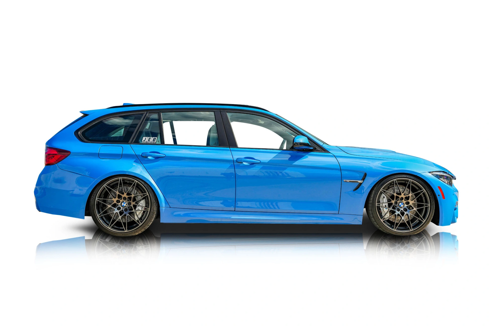 An incredible side shot photo of a BMW 328i that you should buy.