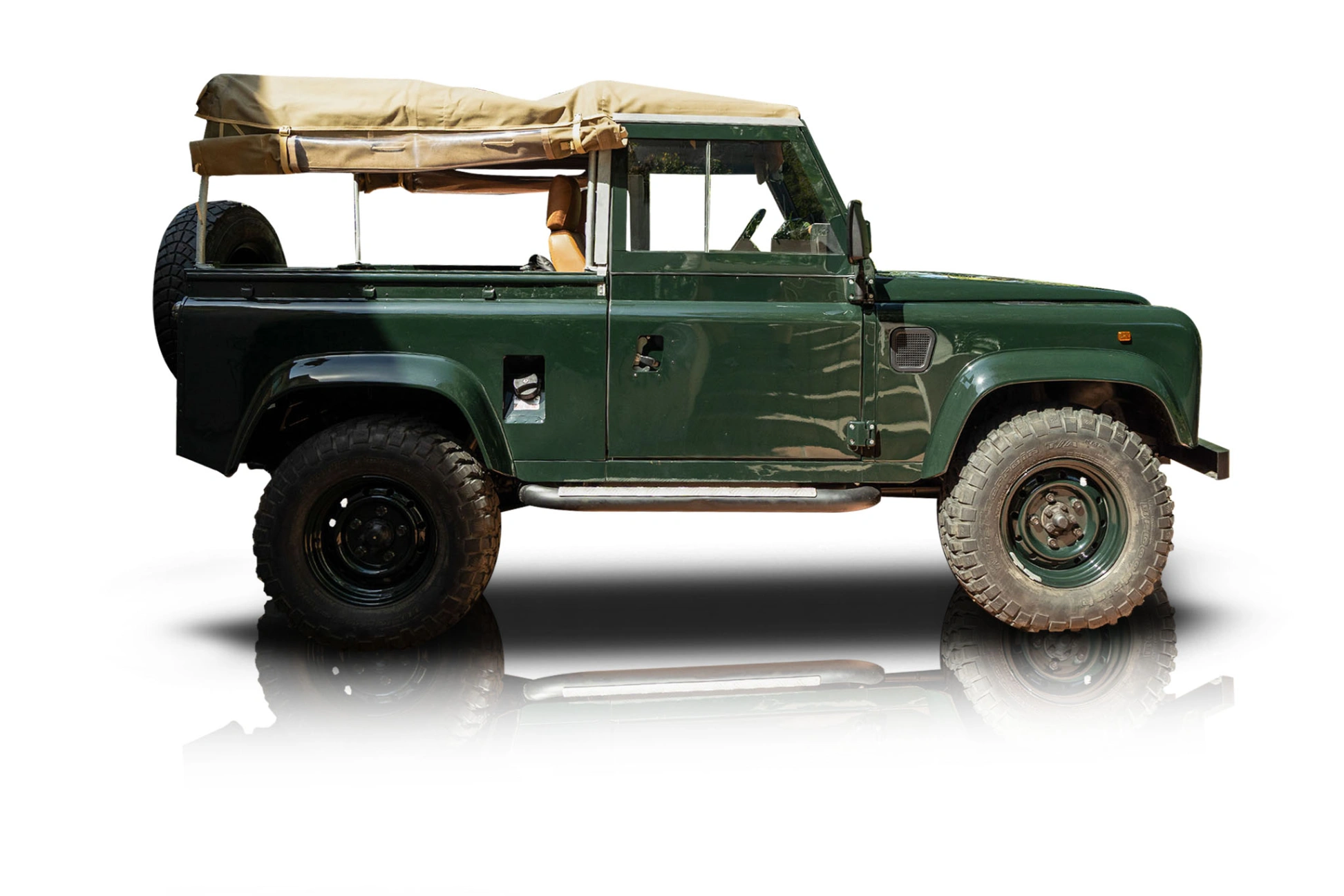 An incredible side shot photo of a Land Rover Defender 90 that you should buy.