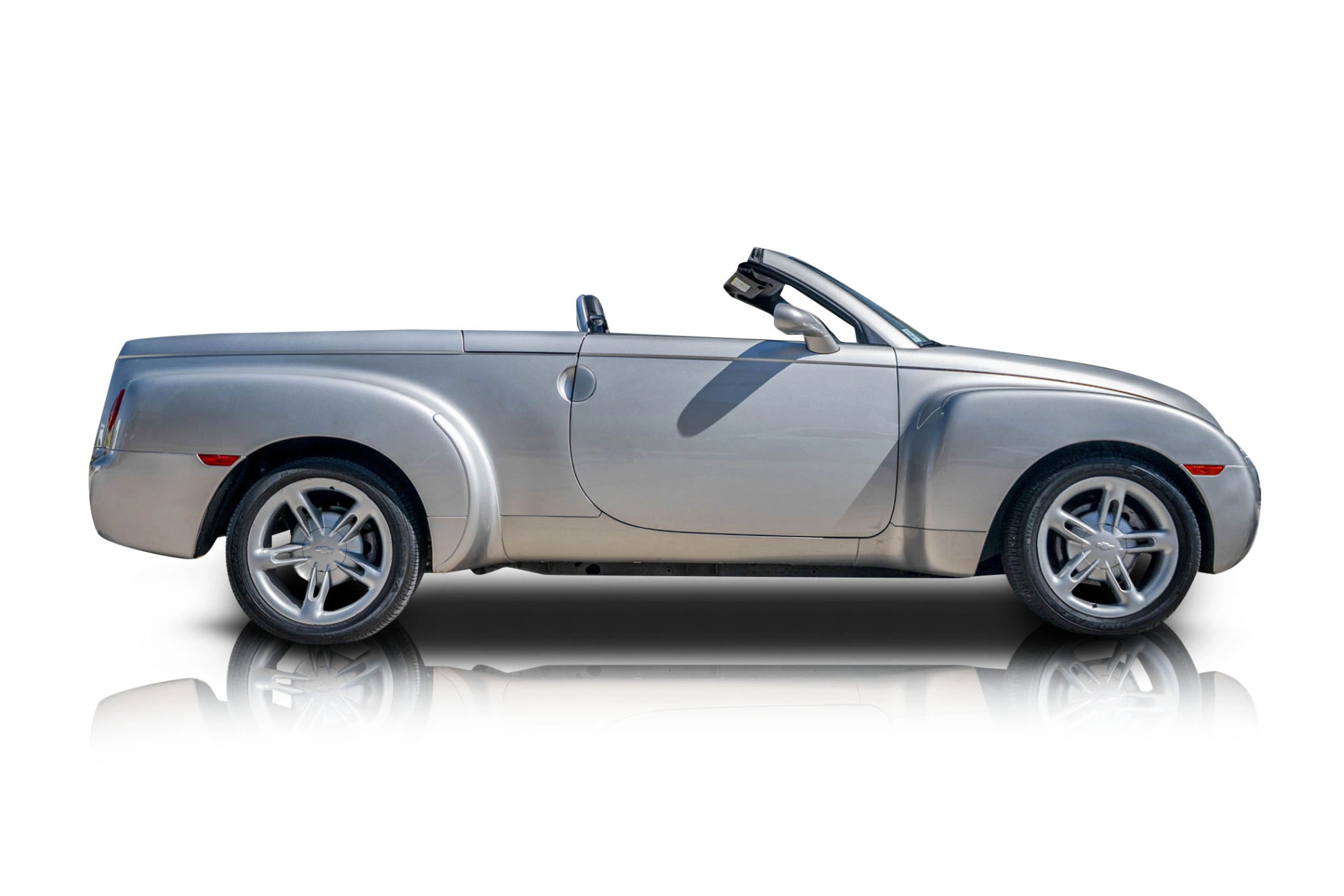 An incredible side shot photo of a Chevrolet SSR that you should buy.