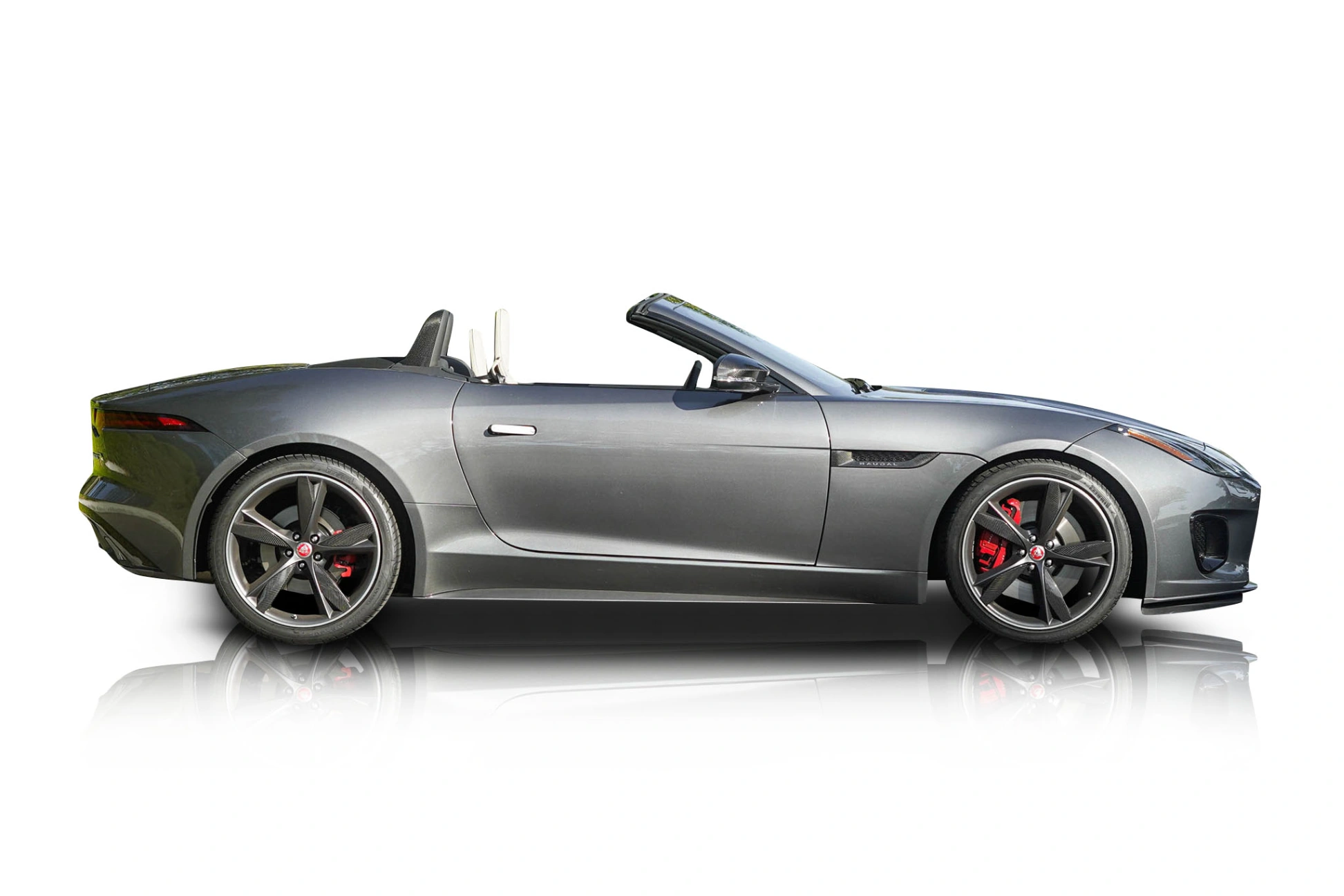 An incredible side shot photo of a Jaguar F-Type that you should buy.