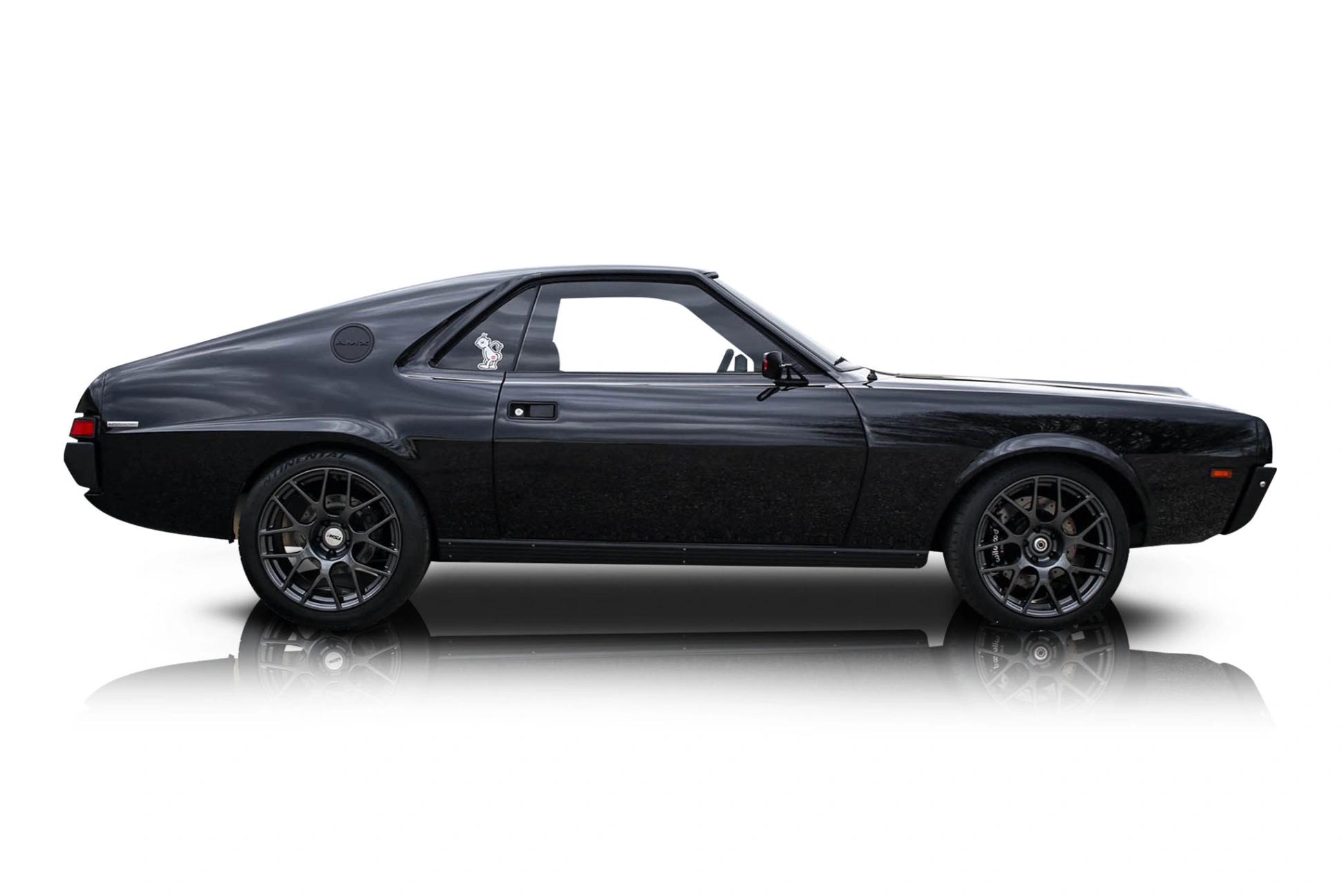 An incredible side shot photo of a AMC AMX that you should buy.