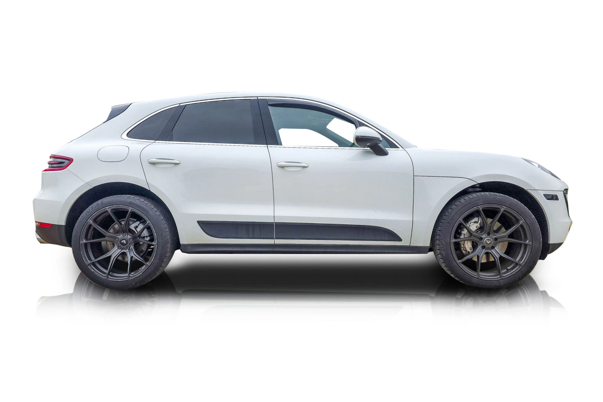 An incredible side shot photo of a Porsche Macan that you should buy.
