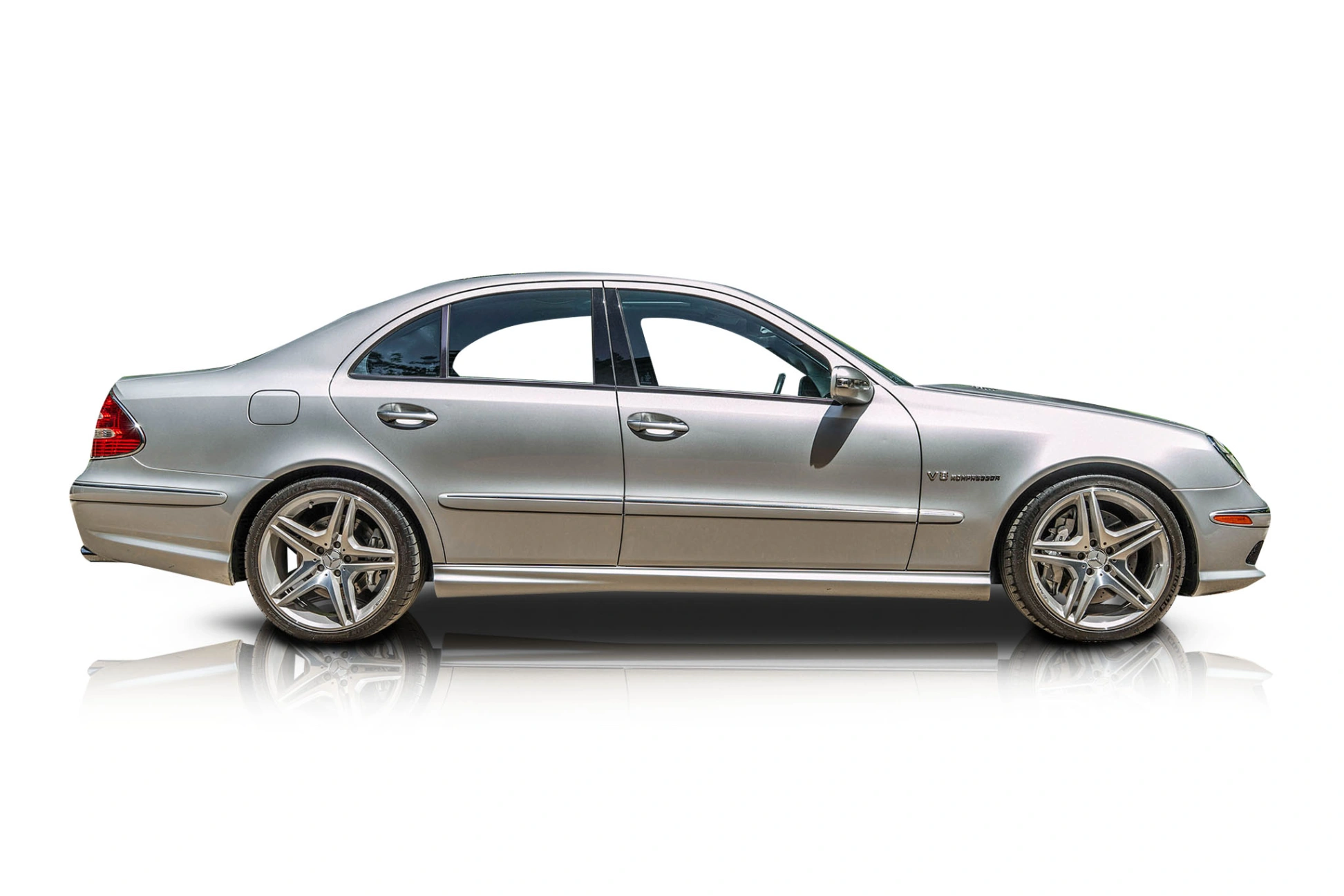 An incredible side shot photo of a Mercedes-Benz E55 AMG that you should buy.