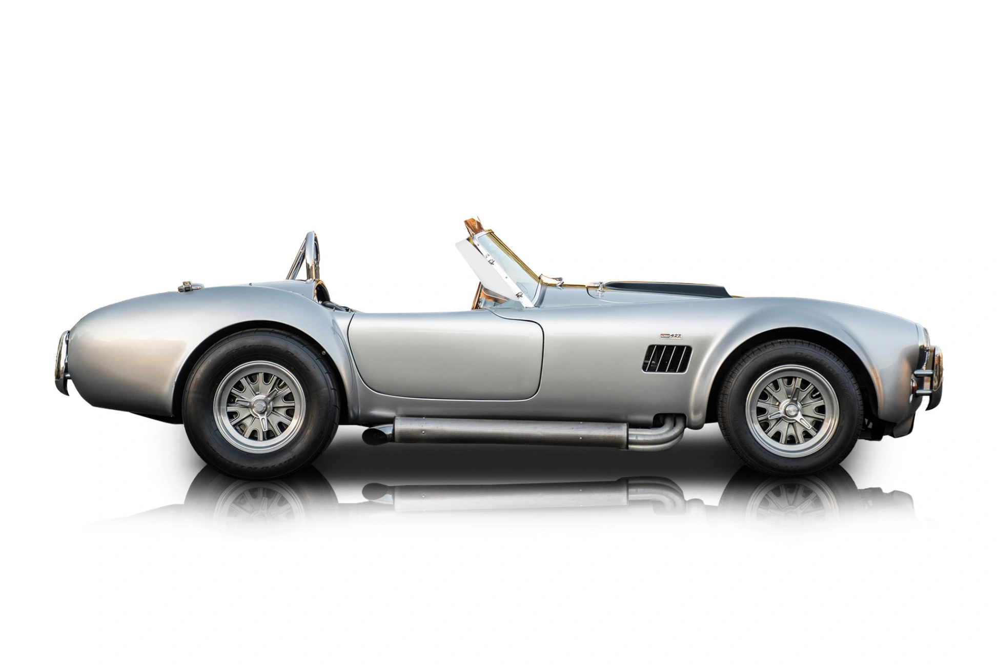 An incredible side shot photo of a Shelby Cobra that you should buy.