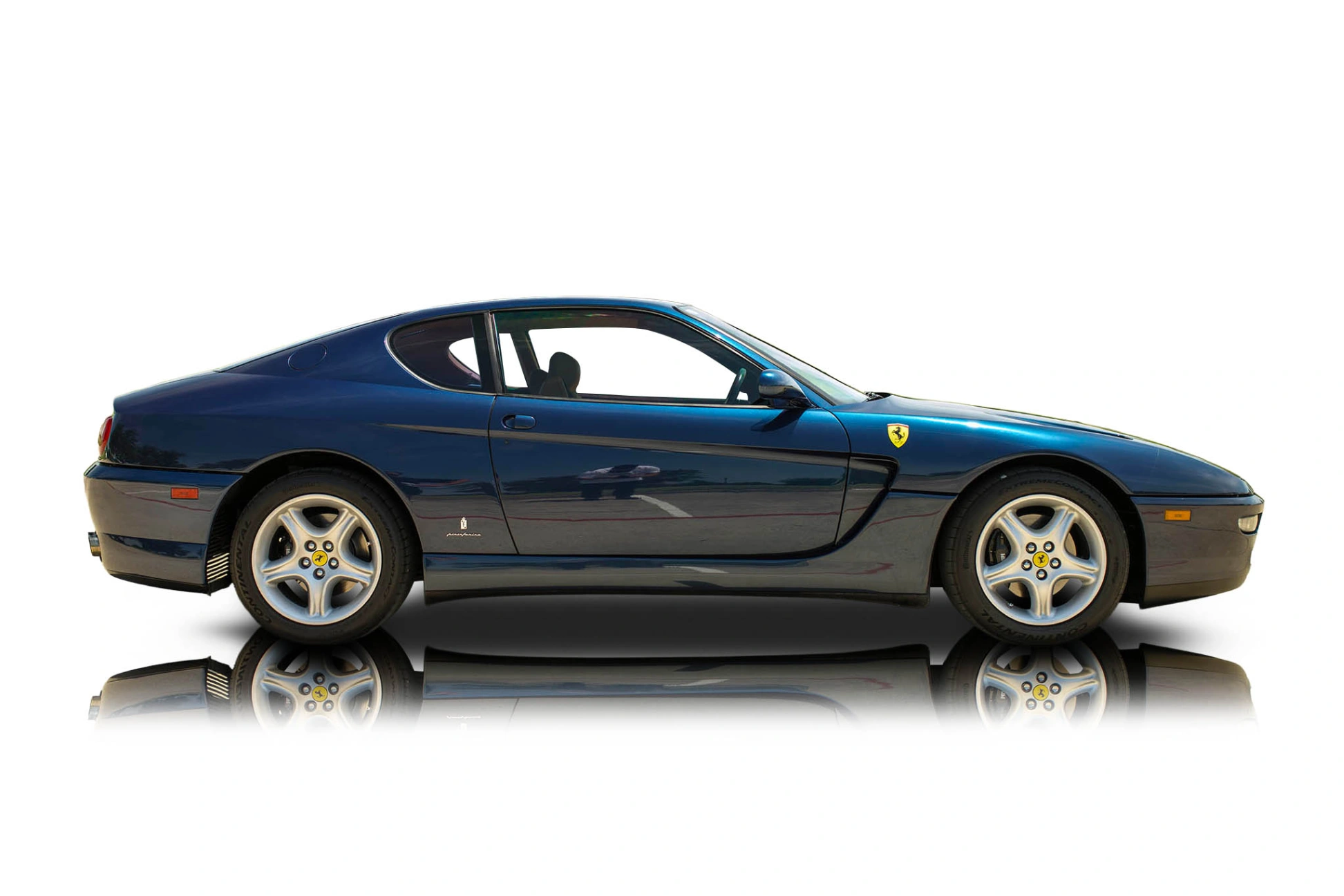 An incredible side shot photo of aFerrari 456 that you should buy.