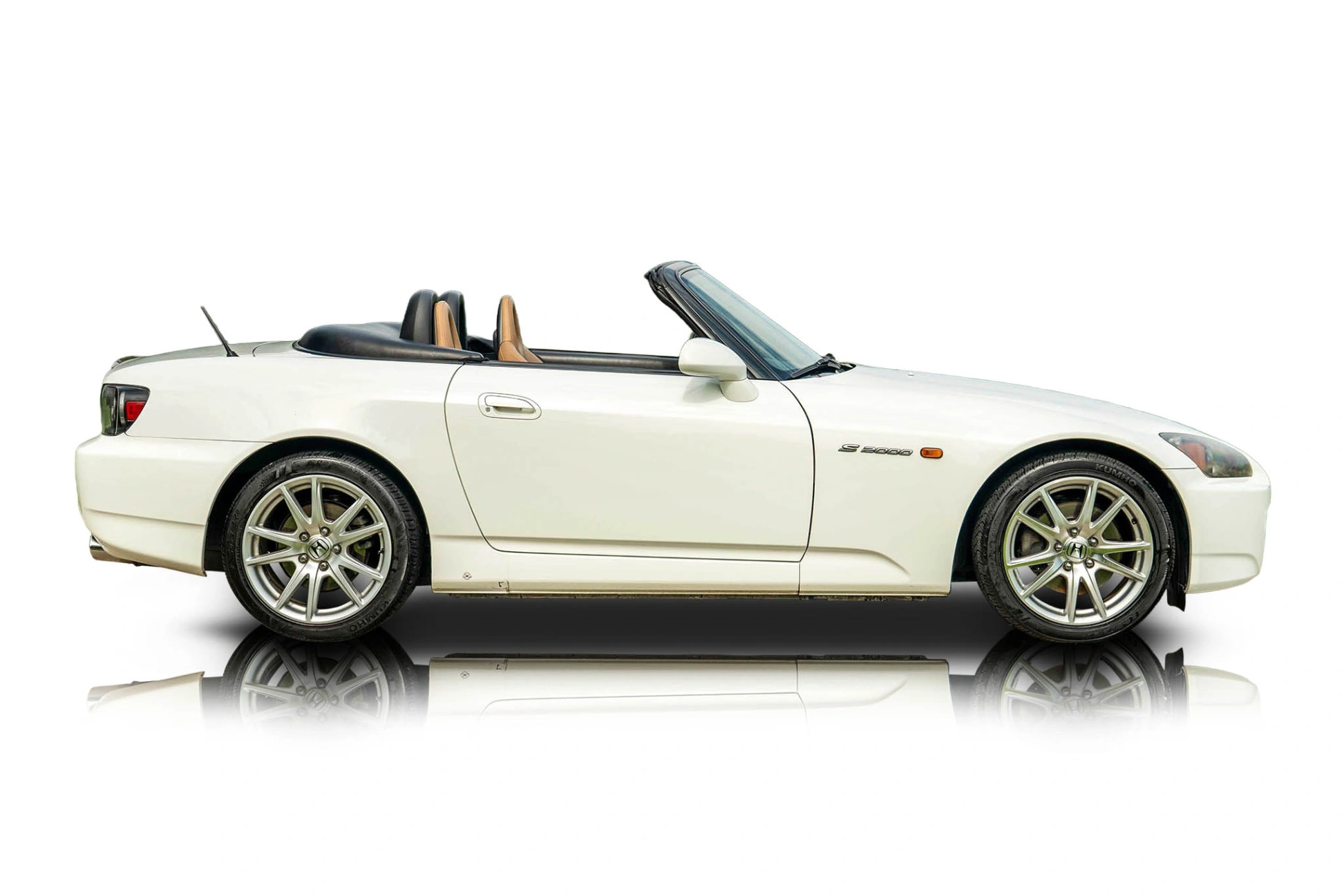 An incredible side shot photo of aHonda S2000 that you should buy.